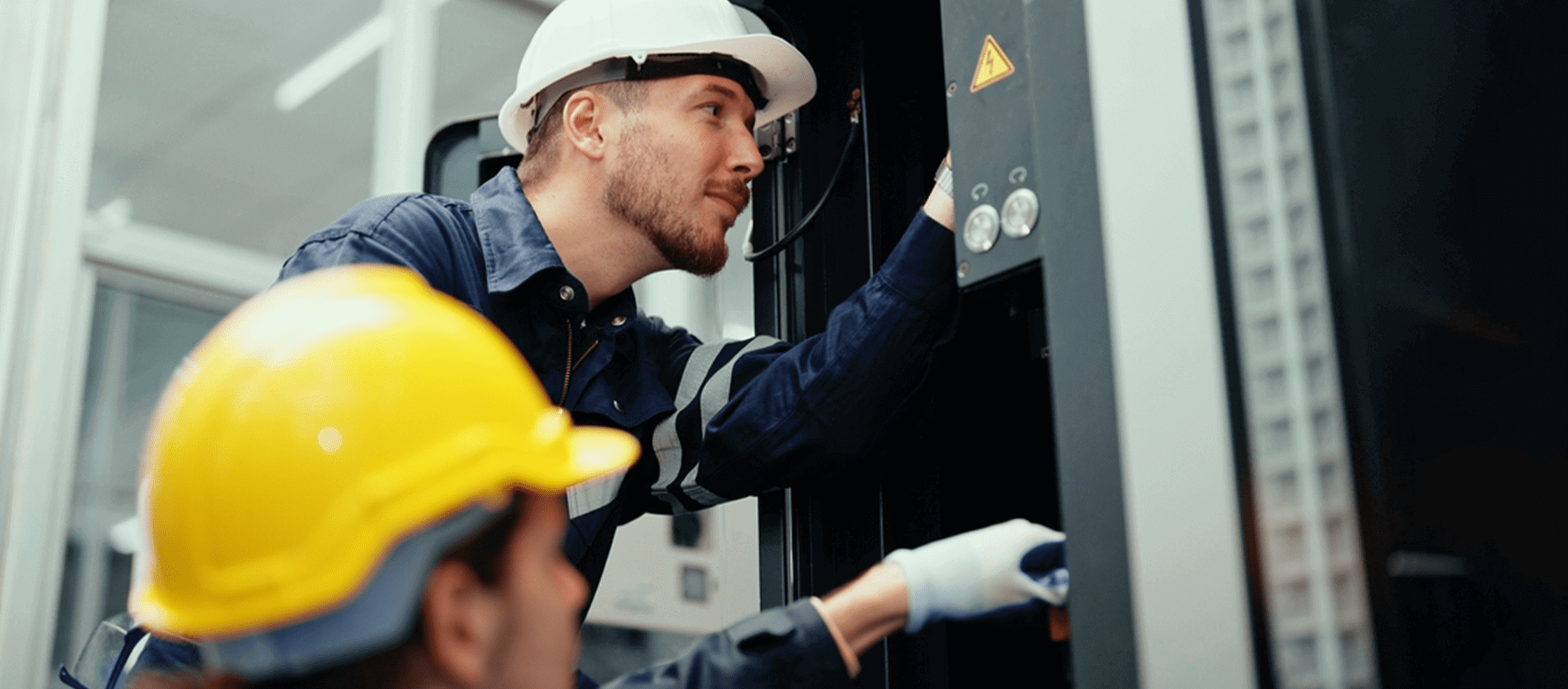  two electricians working